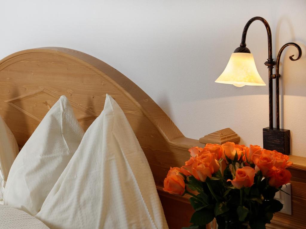Postel nebo postele na pokoji v ubytování Hotel Plateau Rosa