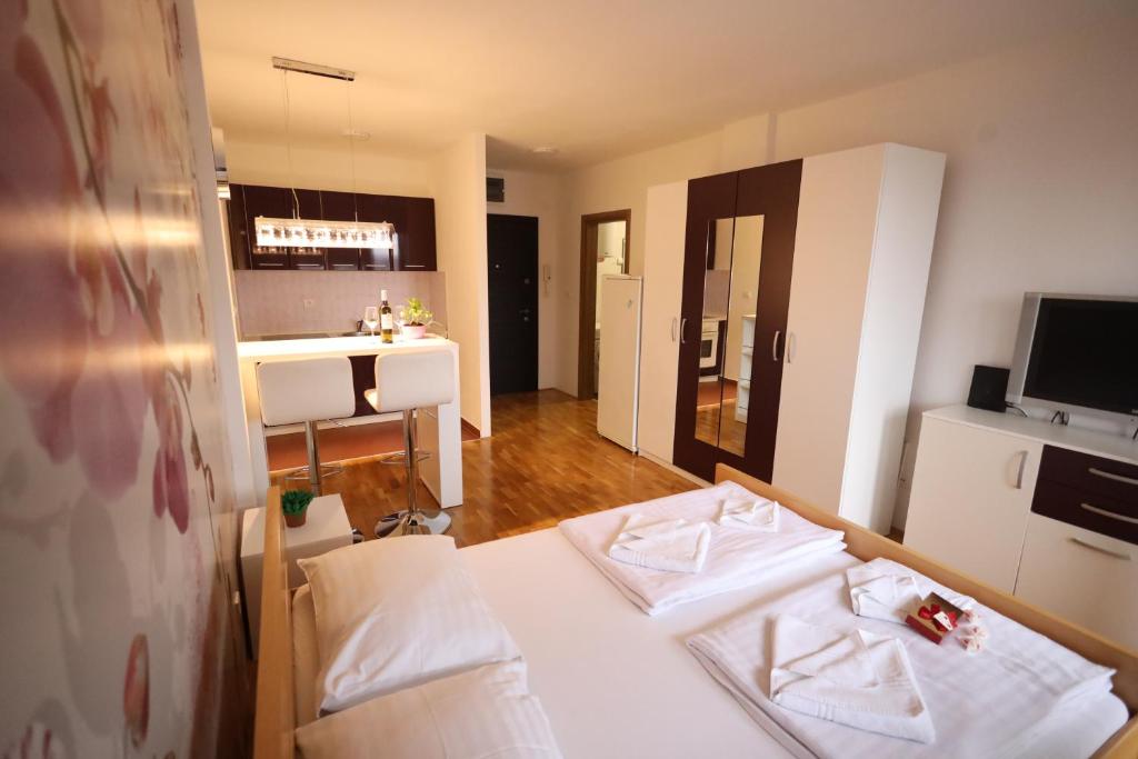 Postel nebo postele na pokoji v ubytování Apartman Dana