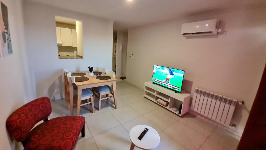 TV a/nebo společenská místnost v ubytování Confort Río Cuarto I