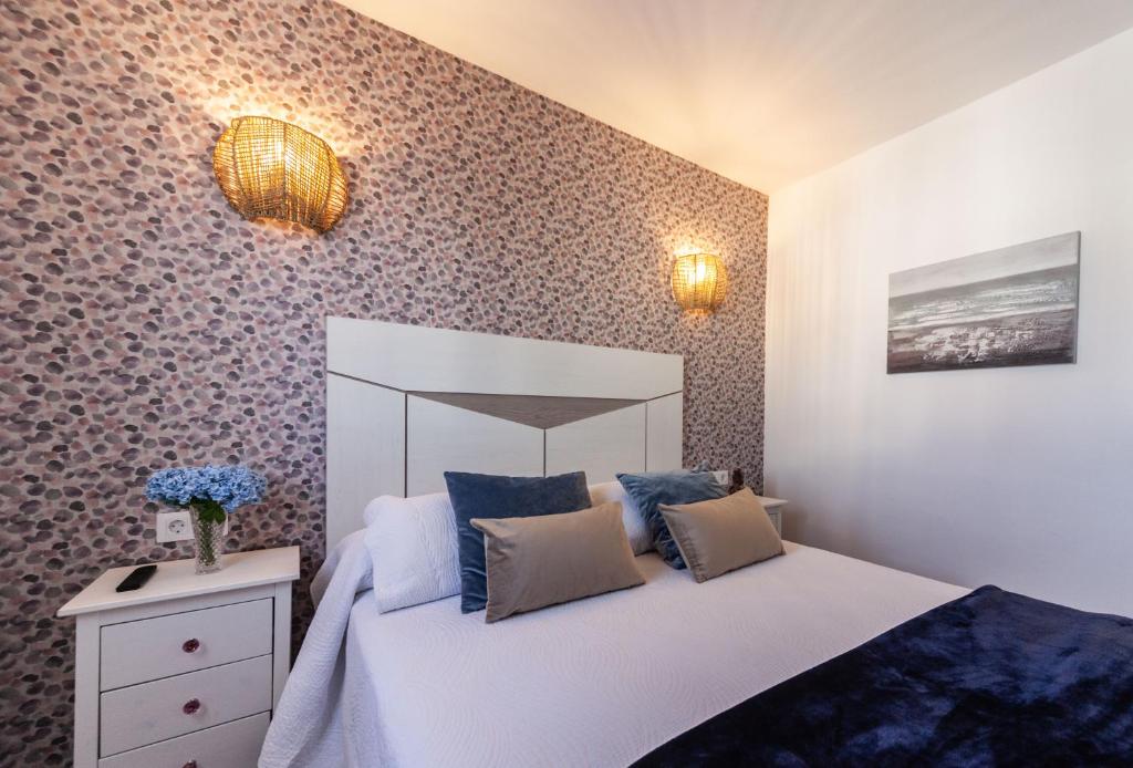 Katil atau katil-katil dalam bilik di Luxury Beach Apartments Diama