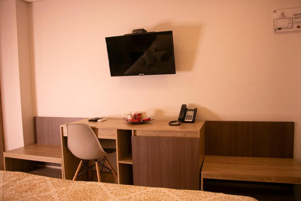 TV a/nebo společenská místnost v ubytování Cartagena Royal Hotel Boutique