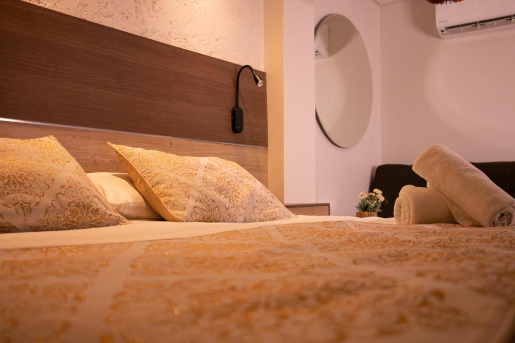 Postel nebo postele na pokoji v ubytování Cartagena Royal Hotel Boutique
