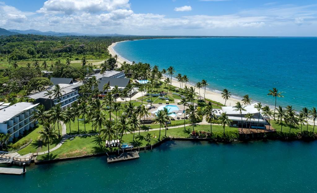 an aerial view of the resort and the beach at The Pearl South Pacific Resort, Spa & Golf Course in Pacific Harbour