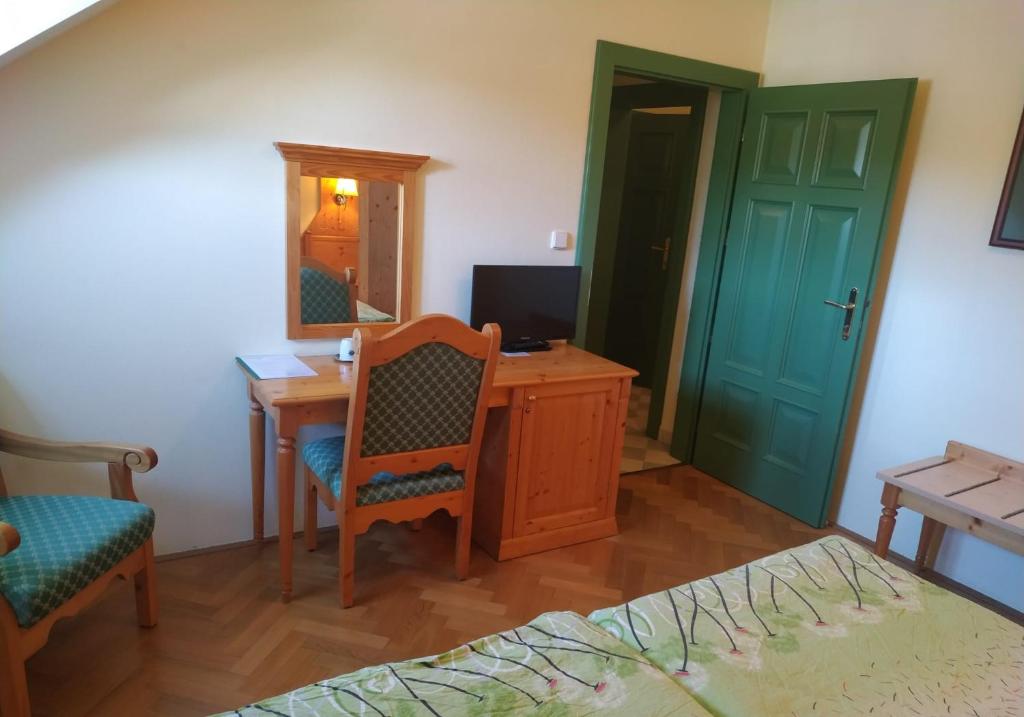 TV a/nebo společenská místnost v ubytování Hotel Svatý Tomáš