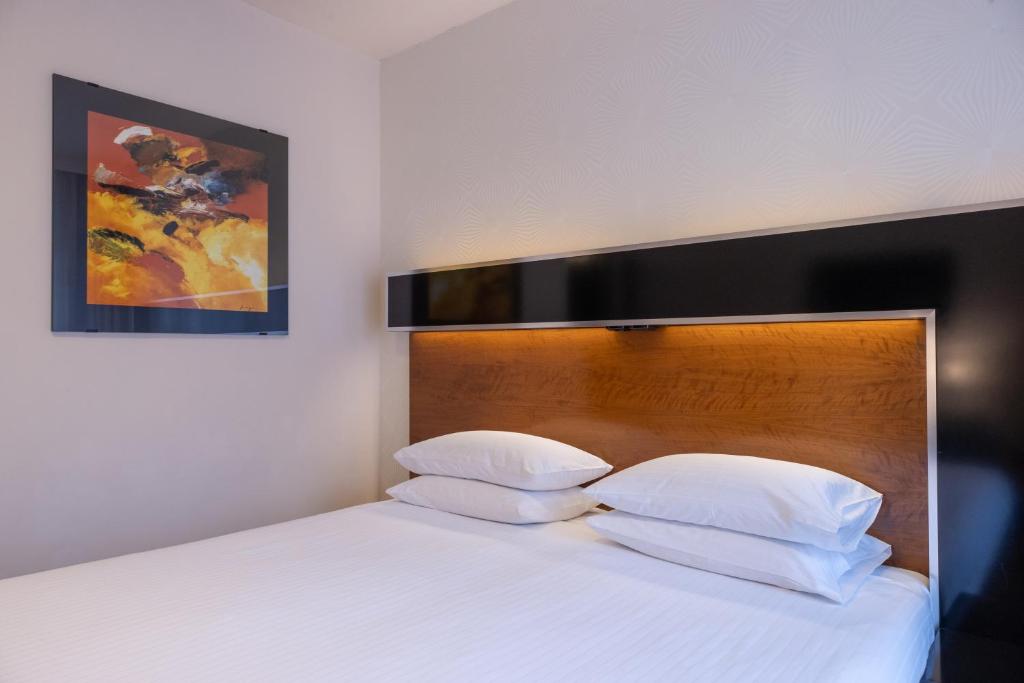 Postel nebo postele na pokoji v ubytování Grand Majestic Hotel Prague