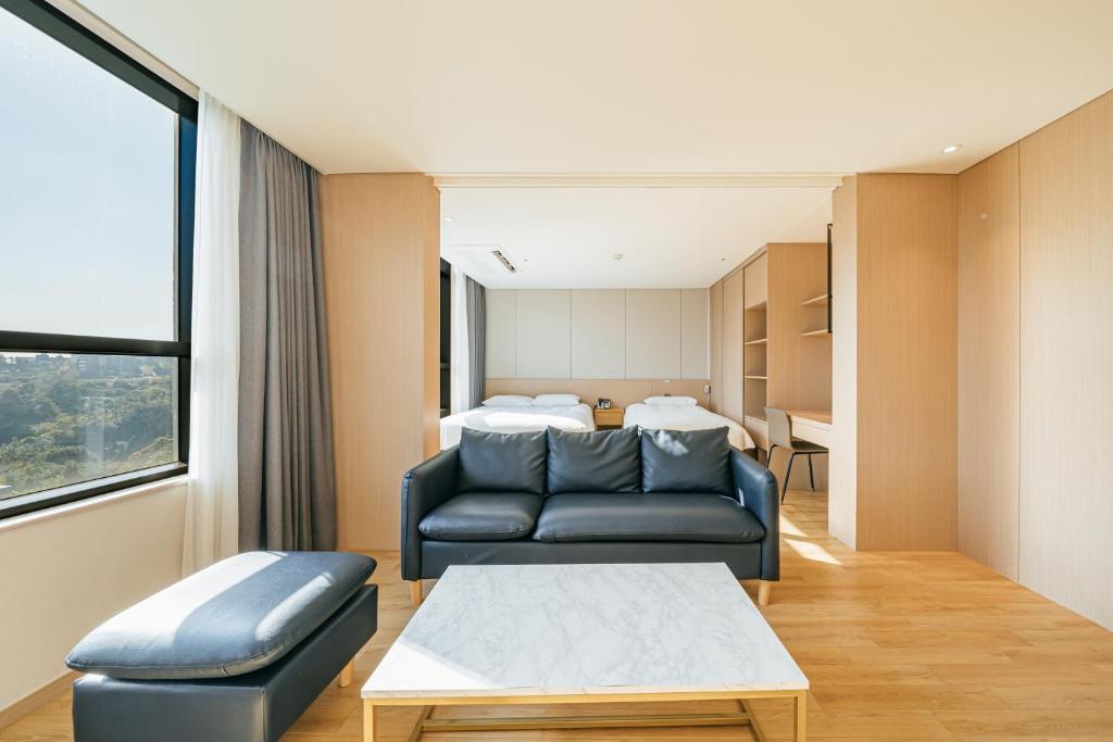 Postel nebo postele na pokoji v ubytování Hotel Zinc