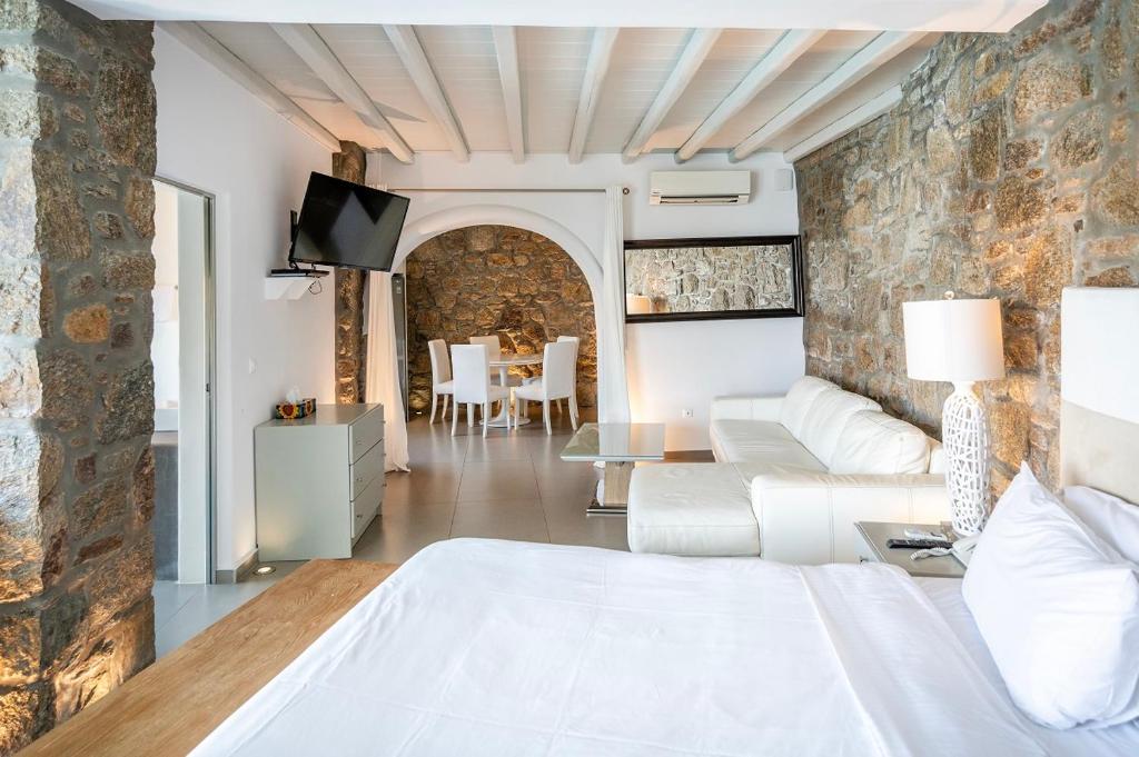 Postel nebo postele na pokoji v ubytování Greco Philia Hotel Boutique