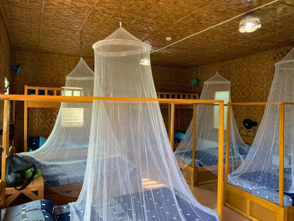 Postel nebo postele na pokoji v ubytování Izla Soanna