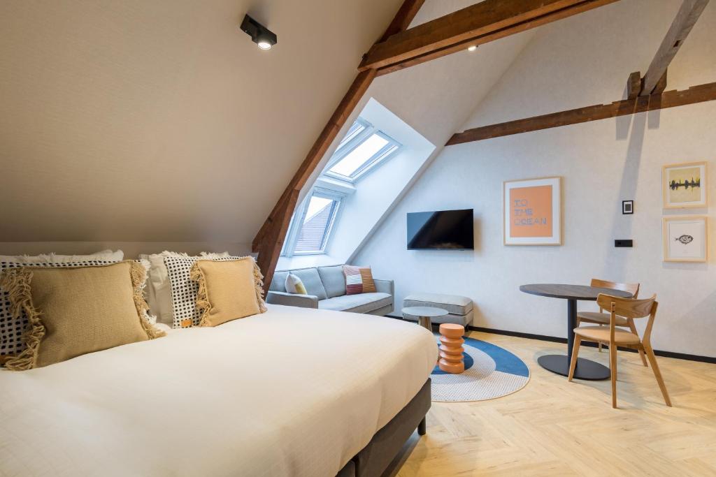 TV a/nebo společenská místnost v ubytování Ocean House Scheveningen