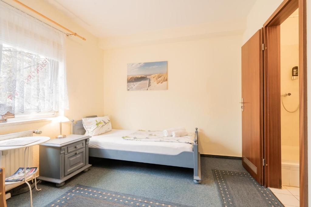 Postel nebo postele na pokoji v ubytování Hotel Dori´s 108