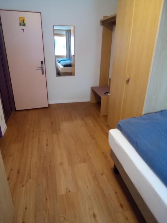 Postel nebo postele na pokoji v ubytování Alpenlodge Kühboden