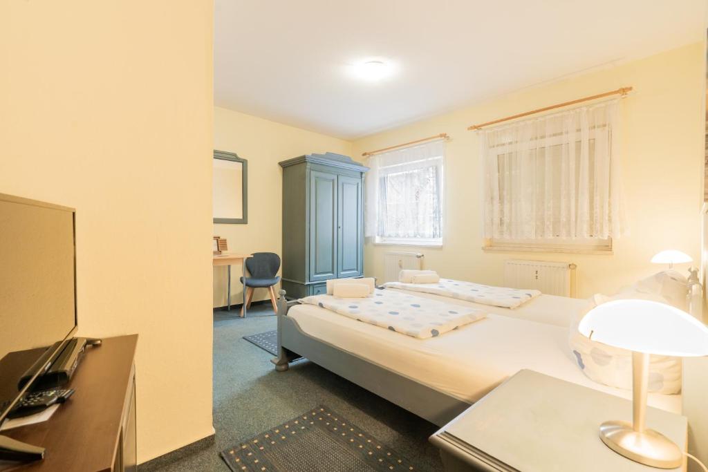 Postel nebo postele na pokoji v ubytování Hotel Dori´s 108