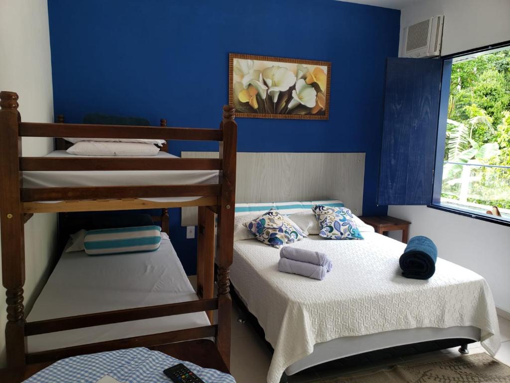 Postel nebo postele na pokoji v ubytování Pousada Rancho do André