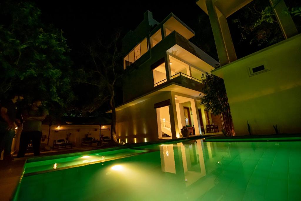 Bazén v ubytování The Residence Hikkaduwa nebo v jeho okolí