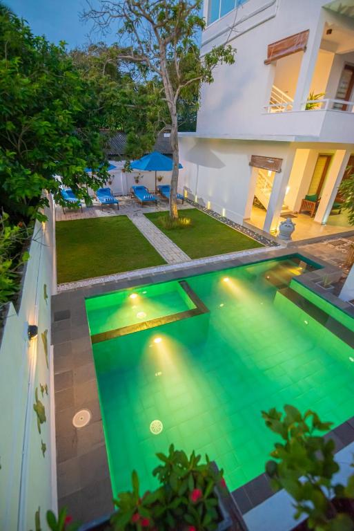 Bazén v ubytování The Residence Hikkaduwa nebo v jeho okolí