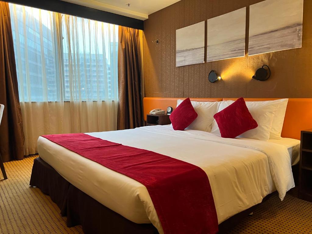 Ένα ή περισσότερα κρεβάτια σε δωμάτιο στο Best Western Plus Tsim Sha Tsui