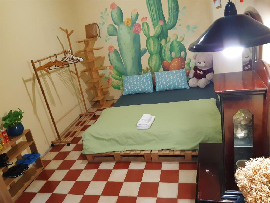 Postel nebo postele na pokoji v ubytování Homestay Gác Mơ Vũng Tàu