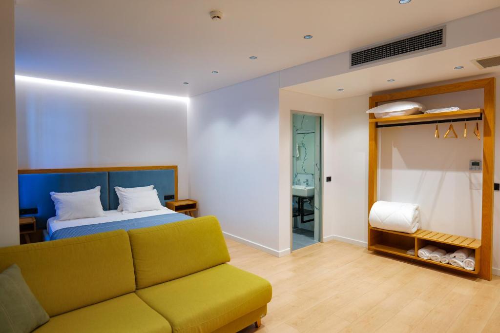 Postel nebo postele na pokoji v ubytování Hotel Nertili