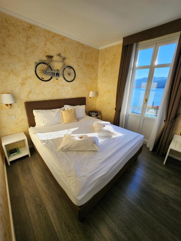 Postel nebo postele na pokoji v ubytování Hotel Millennium