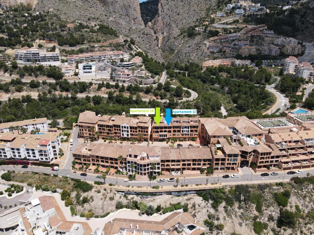 an aerial view of a resort with a mountain at Luxury Apartments Mascarat in Altea