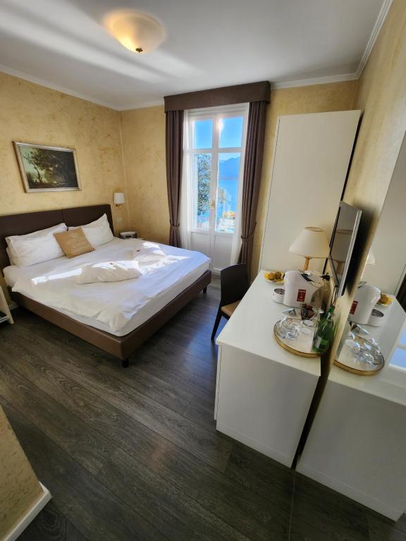 Postel nebo postele na pokoji v ubytování Hotel Millennium