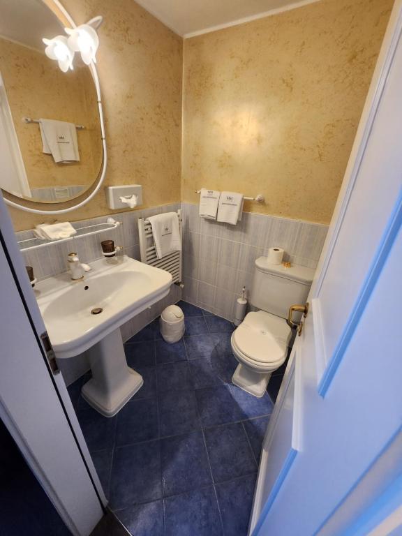 Koupelna v ubytování Hotel Millennium