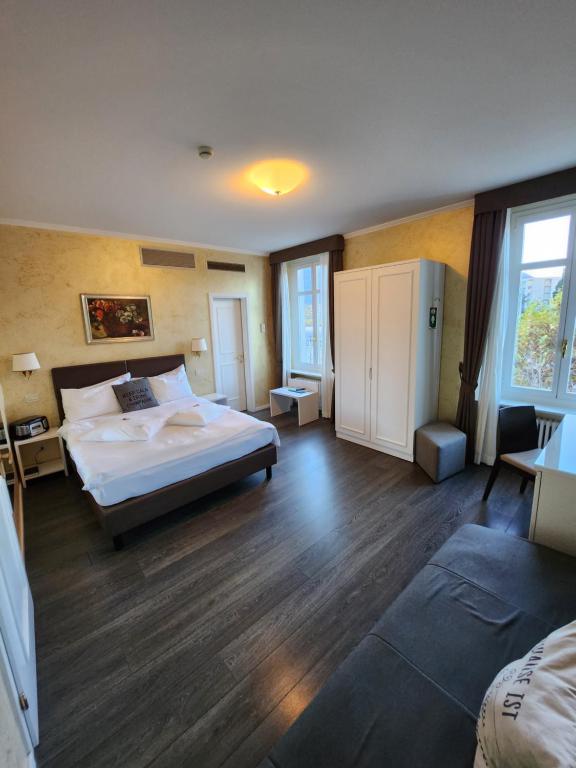Postel nebo postele na pokoji v ubytování Hotel Millennium