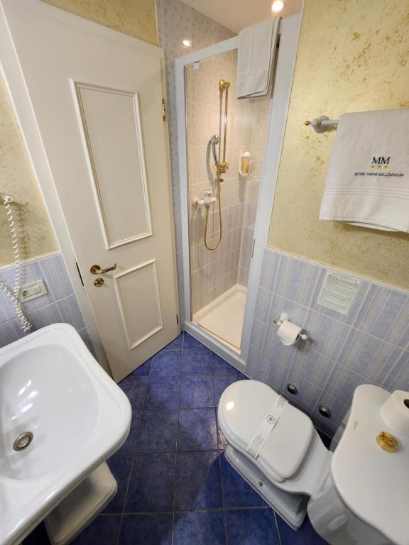 Koupelna v ubytování Hotel Millennium