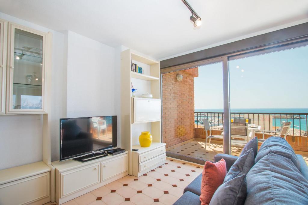 TV a/nebo společenská místnost v ubytování Apartamento Ifach - PlusHolidays