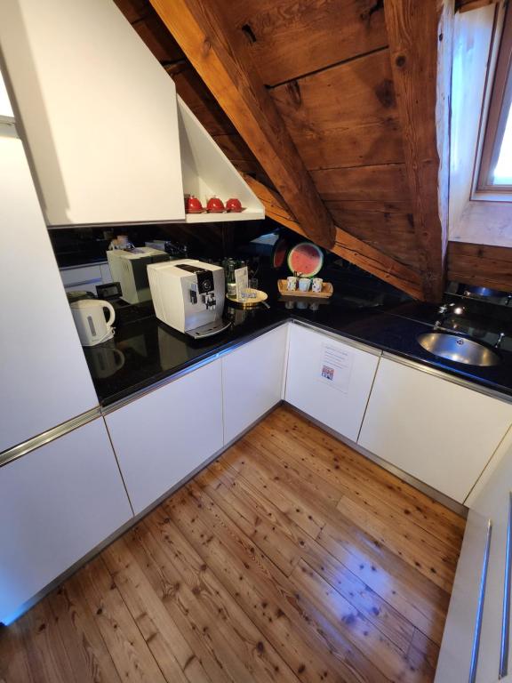 Kuchyň nebo kuchyňský kout v ubytování Hotel Millennium