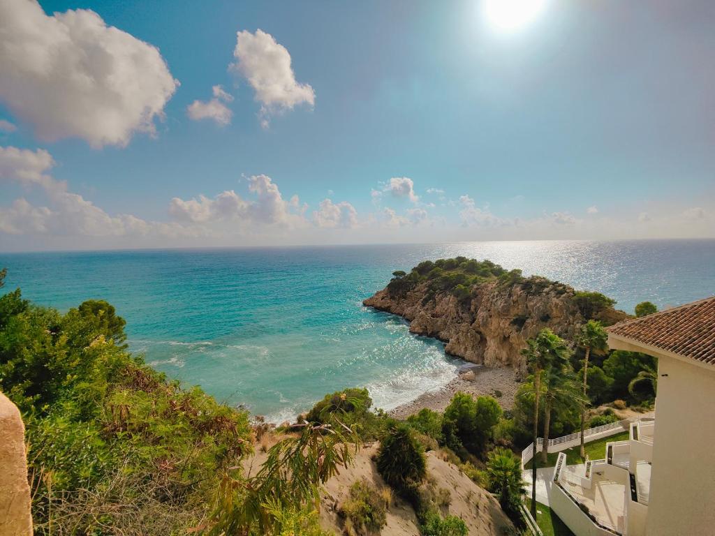 a view of the ocean from a building at Luxury Apartments Mascarat in Altea