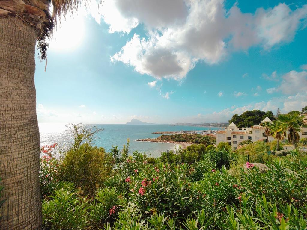 a view of the ocean from a resort at Luxury Apartments Mascarat in Altea