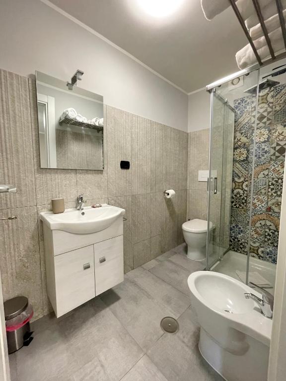 Koupelna v ubytování ALDIVA ROOMS