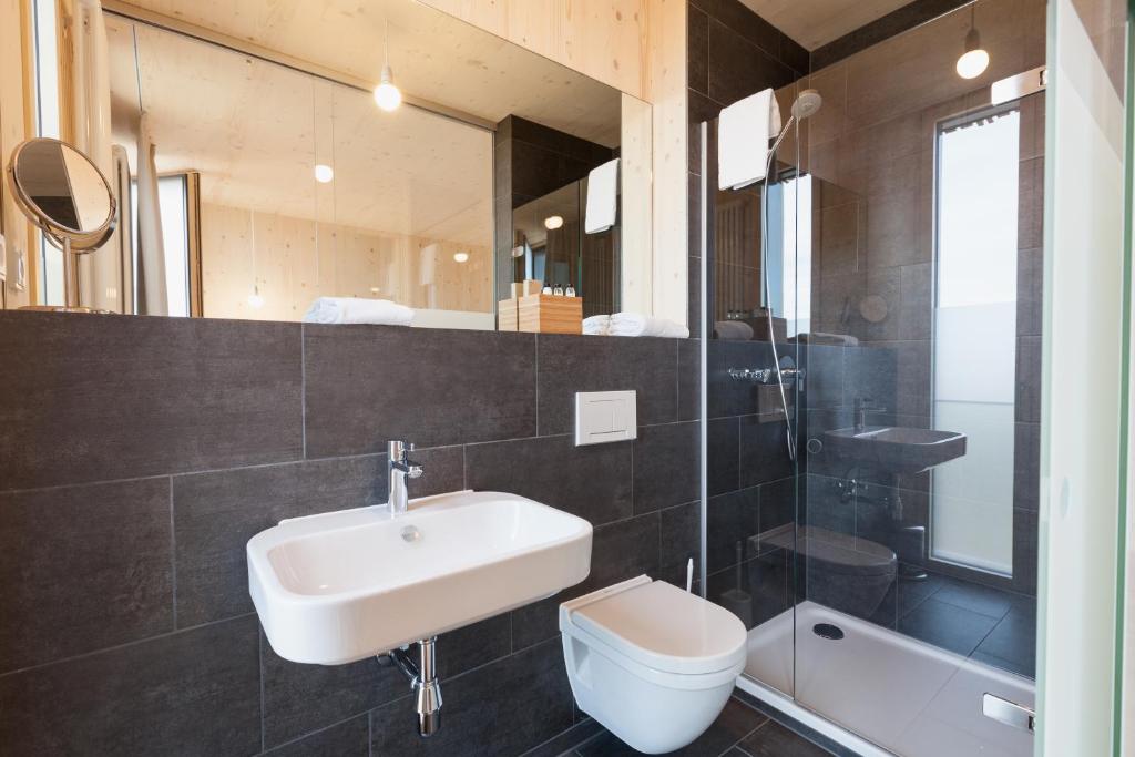 Koupelna v ubytování Bader Hotel