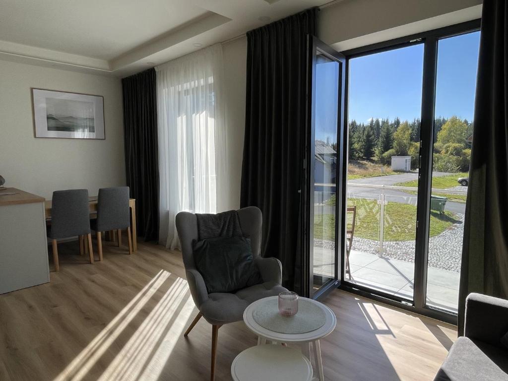 Istumisnurk majutusasutuses Apartmán Plešivec u sjezdovky