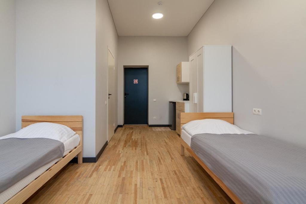 Postel nebo postele na pokoji v ubytování BAZZE