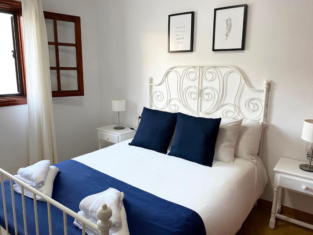Posteľ alebo postele v izbe v ubytovaní Apartamento Natalia