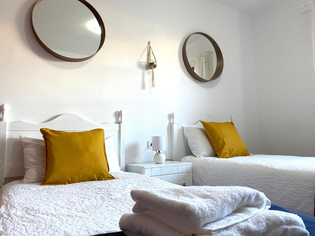 Posteľ alebo postele v izbe v ubytovaní Apartamento Natalia