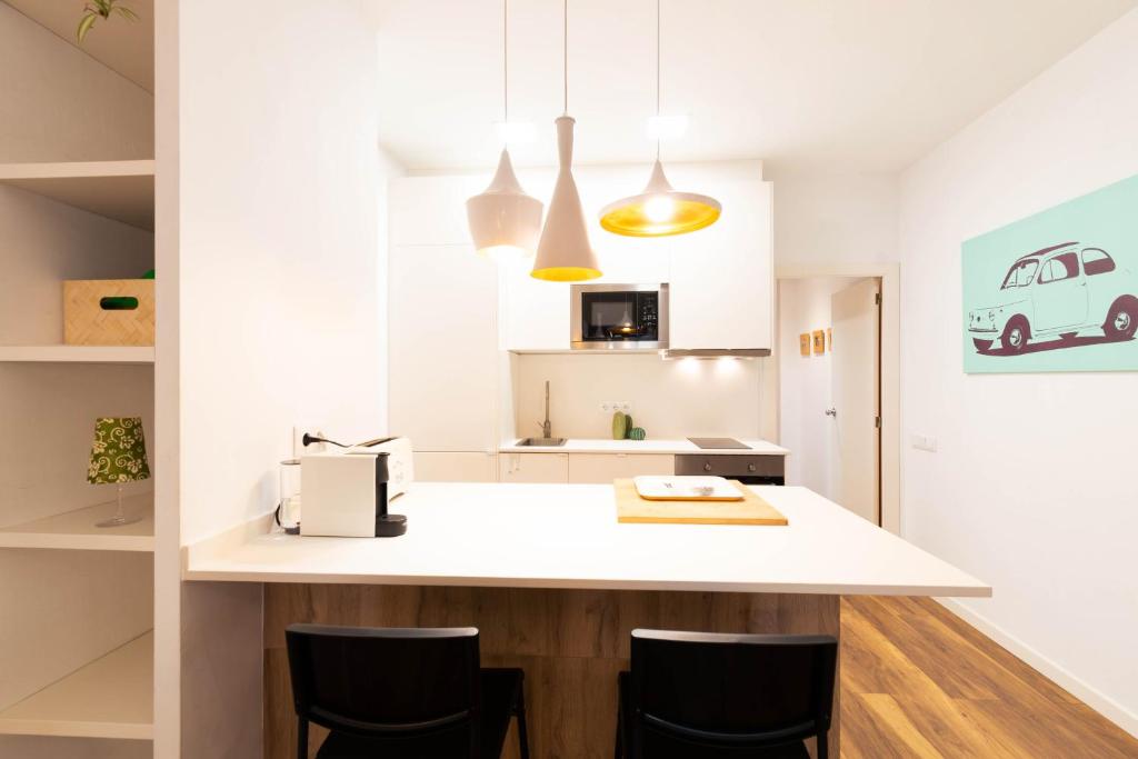Kuchyň nebo kuchyňský kout v ubytování Apartamento en Plaza SEDASSOS Centro Historico