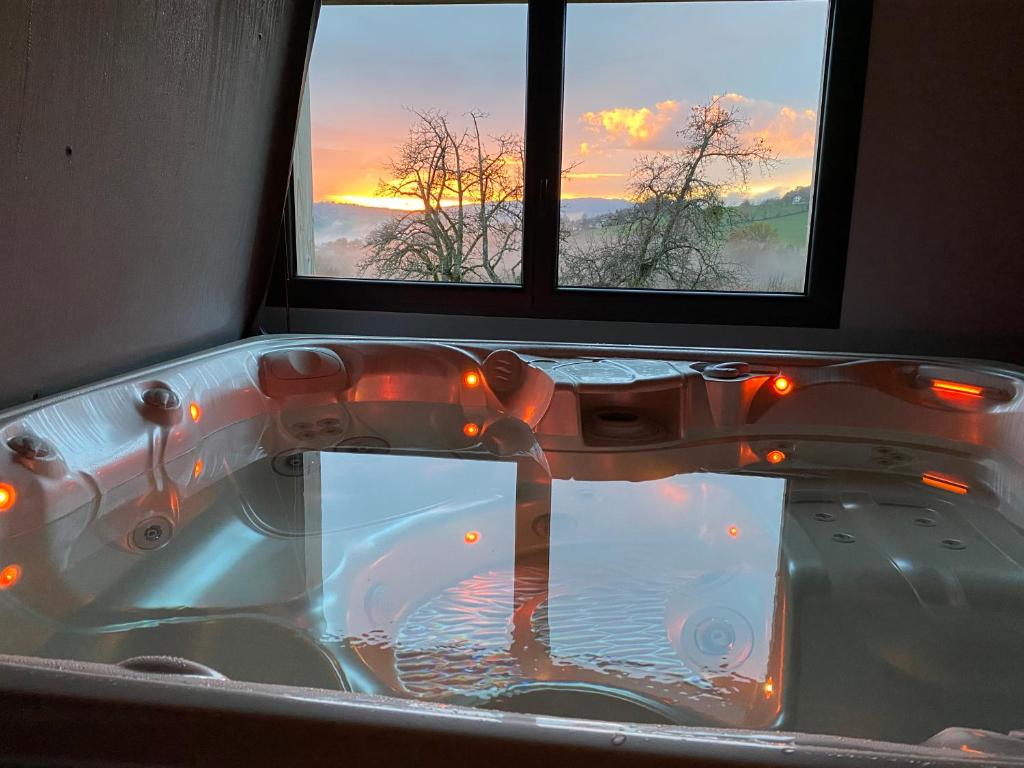 Φωτογραφία από το άλμπουμ του Escapade romantique avec spa privé en pleine nature σε Viuz-en-Sallaz
