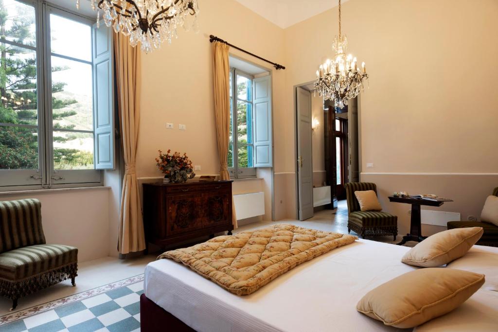 Łóżko lub łóżka w pokoju w obiekcie Villa Angelina - charming rooms & apartments