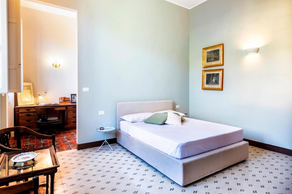 Łóżko lub łóżka w pokoju w obiekcie Villa Angelina - charming rooms & apartments