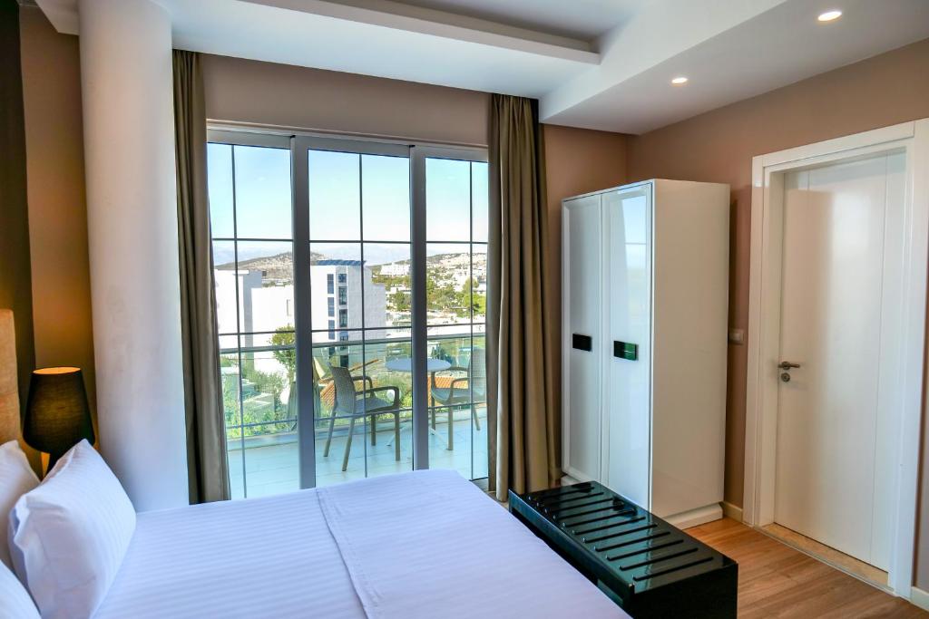 Postel nebo postele na pokoji v ubytování Hotel Luxury
