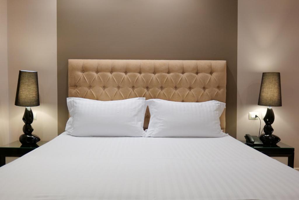 Postel nebo postele na pokoji v ubytování Hotel Luxury