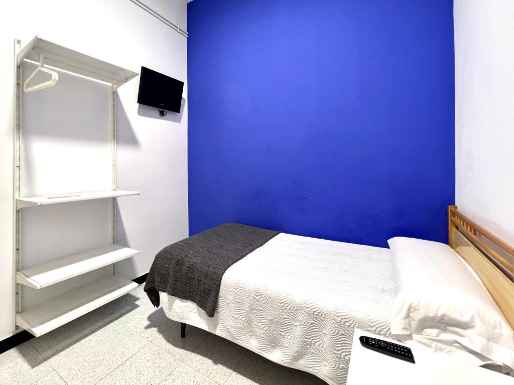 Postel nebo postele na pokoji v ubytování Pensión Peiró