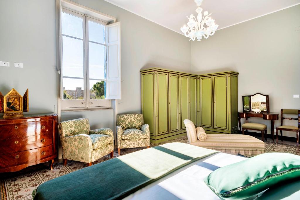 Łóżko lub łóżka w pokoju w obiekcie Villa Angelina - charming rooms & apartments