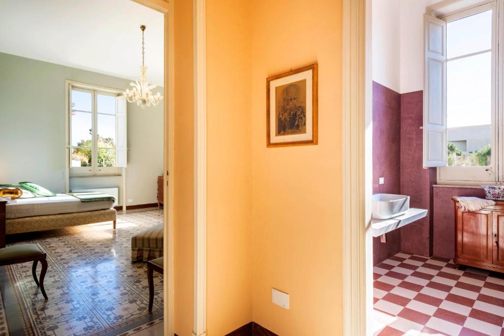Łóżko lub łóżka w pokoju w obiekcie Villa Angelina - charming rooms & apartments