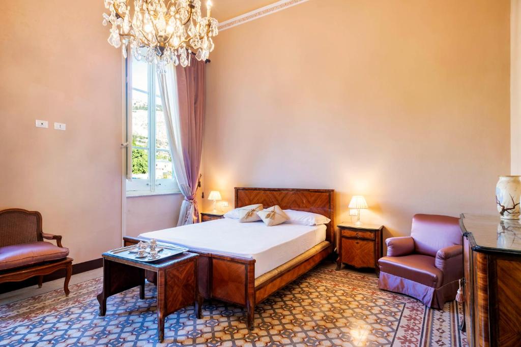Łóżko lub łóżka w pokoju w obiekcie Villa Angelina - charming rooms & apartments