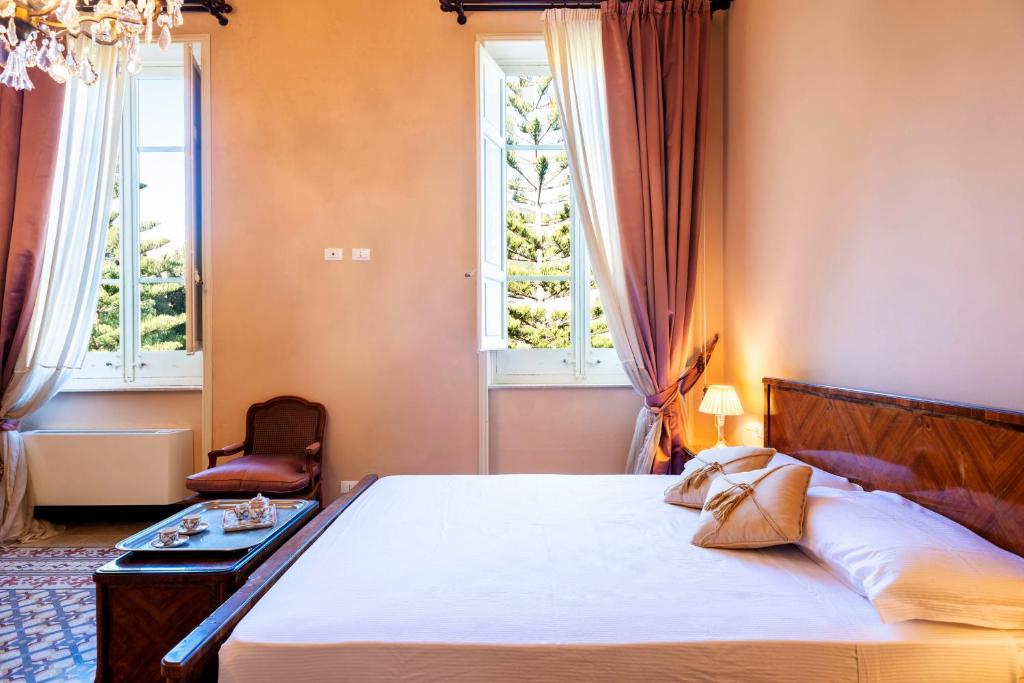 Łóżko lub łóżka w pokoju w obiekcie Villa Angelina - charming rooms & apartments