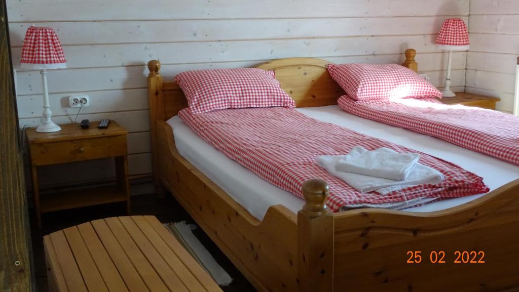 Postel nebo postele na pokoji v ubytování Casuta Schiorului